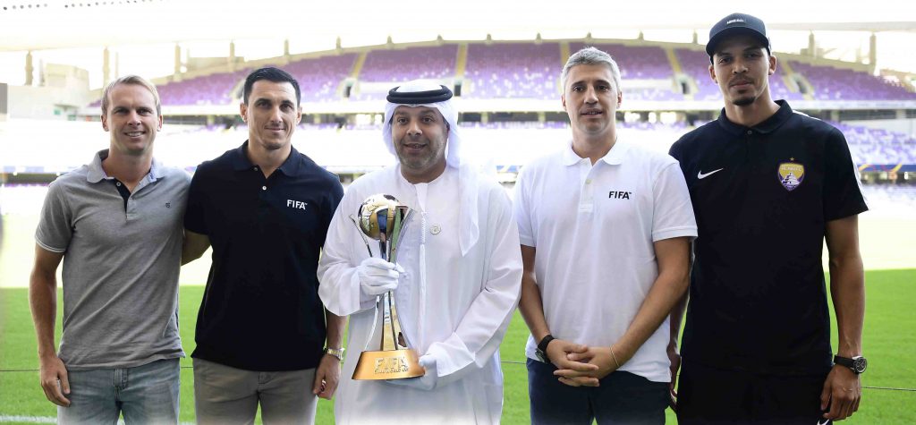 Attended by the Stars of Boca Juniors and River Plate.. Sultan Rashid and Ismael Ahmad Receive the Trophy of the FIFA Club World Cup at HBZS